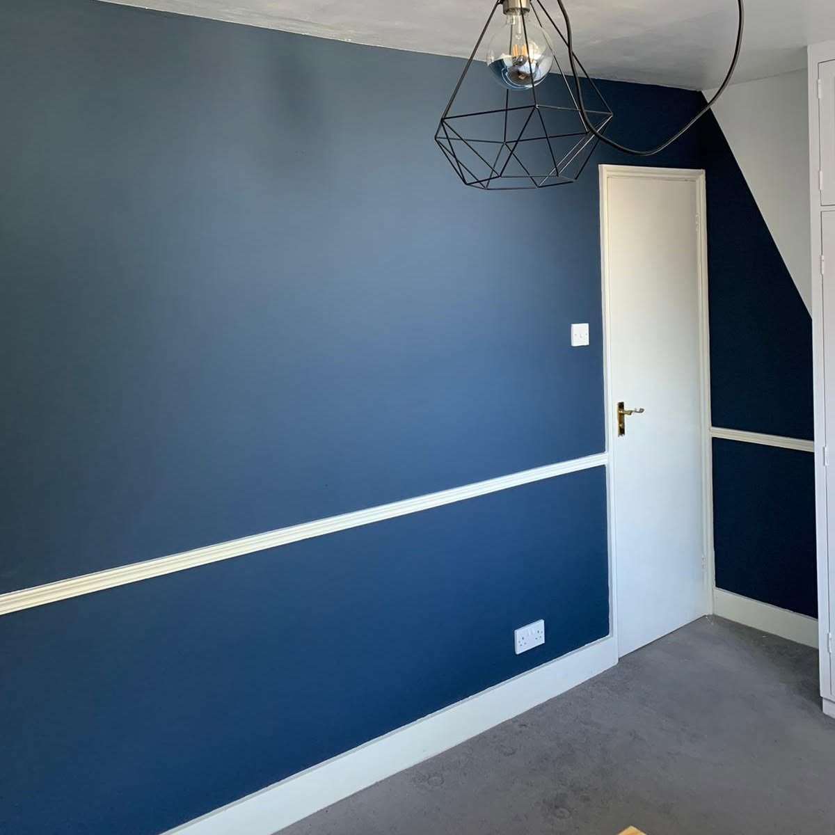 Navy bedroom with dado rail