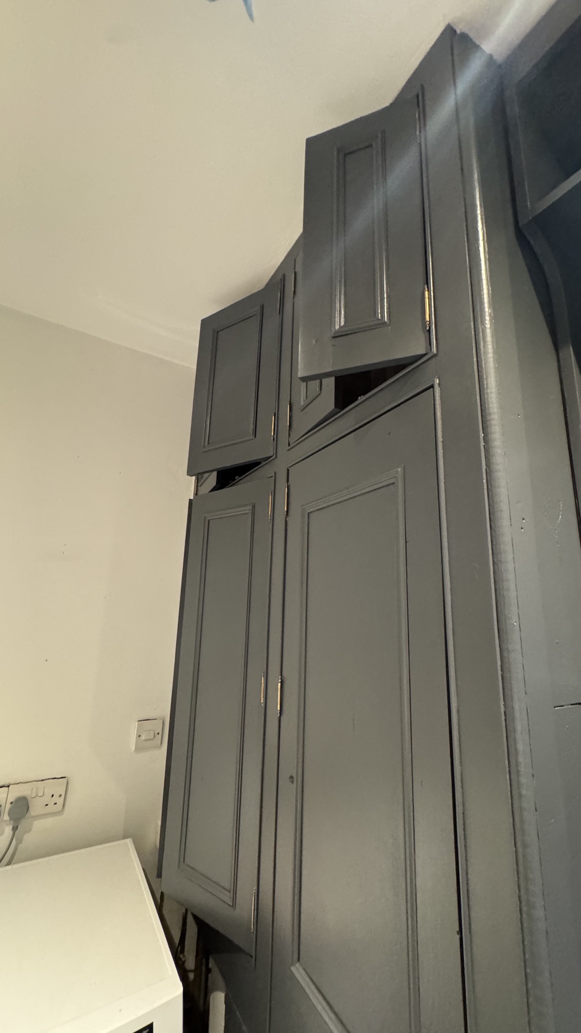 Built-in cupboards painted